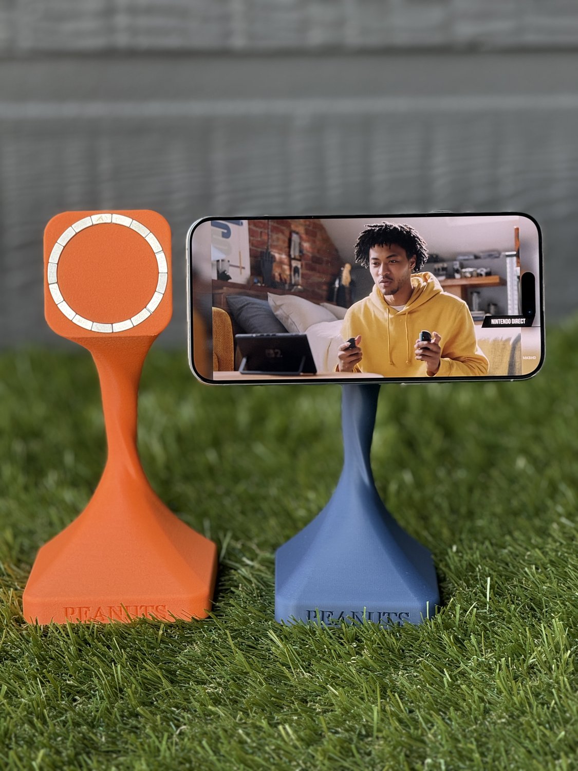 3D-printed MagSafe phone stands in use outdoors